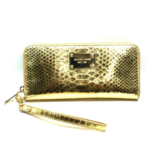 large continental michael kors zip around gold|michael kors leather wristlet.